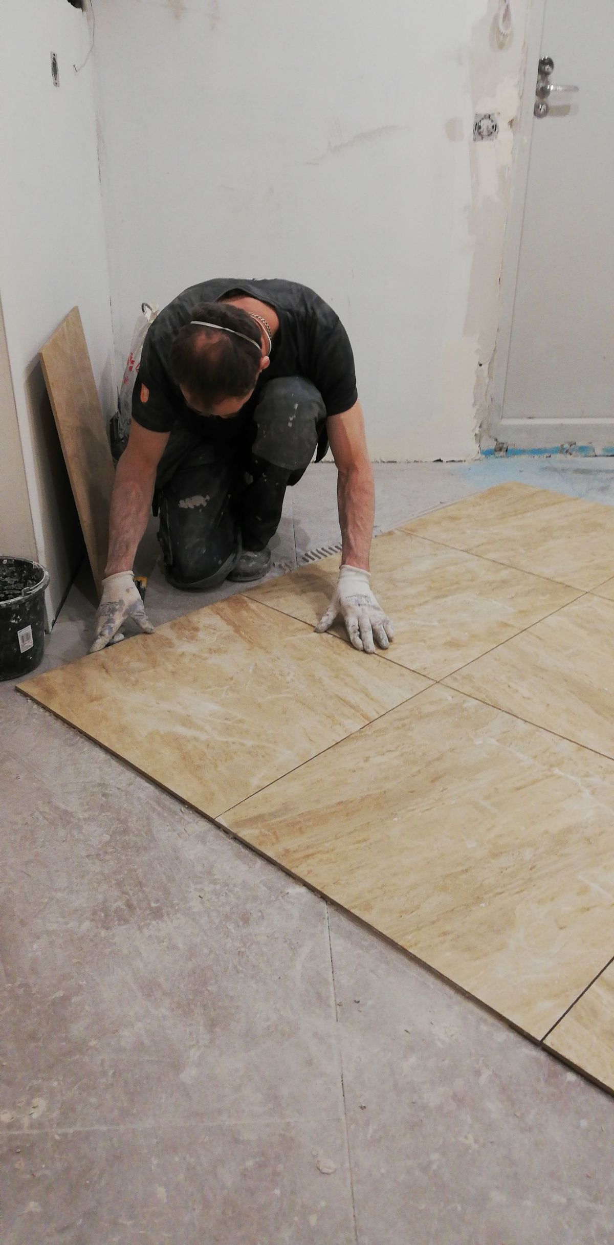 Laying tiles