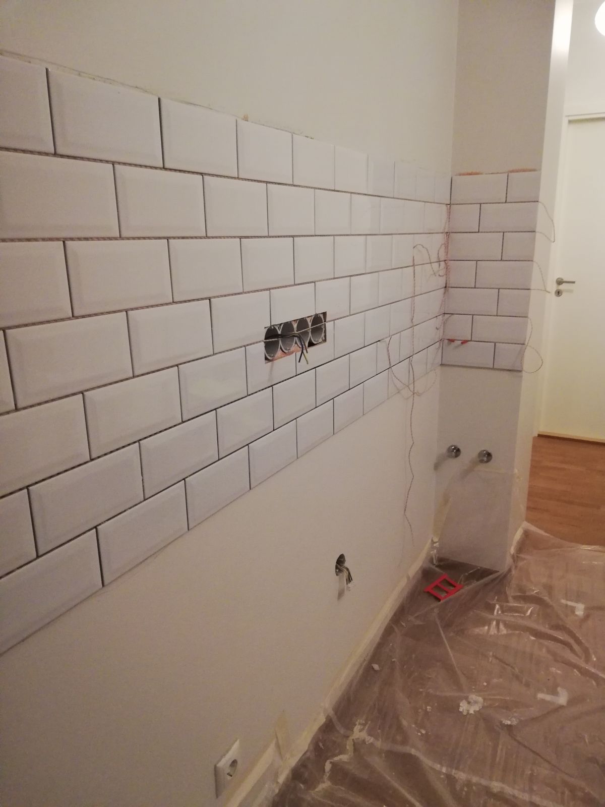 Laying tiles