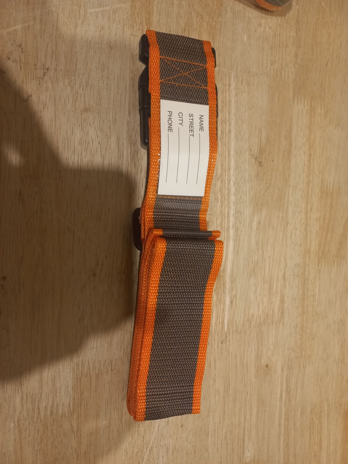 Luggage strap for a suitcase