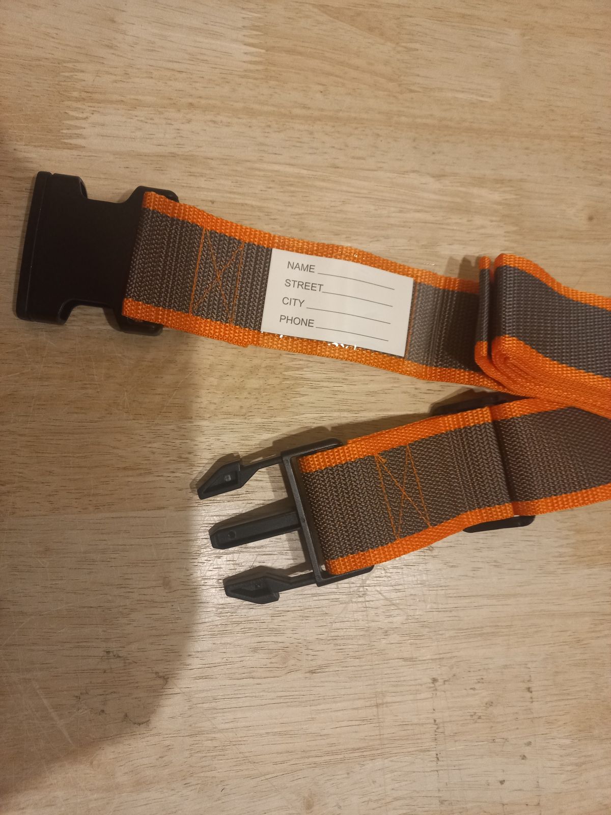 Luggage strap for a suitcase